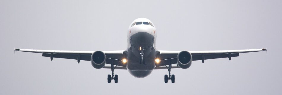 time lapse photography of white commercial airplane